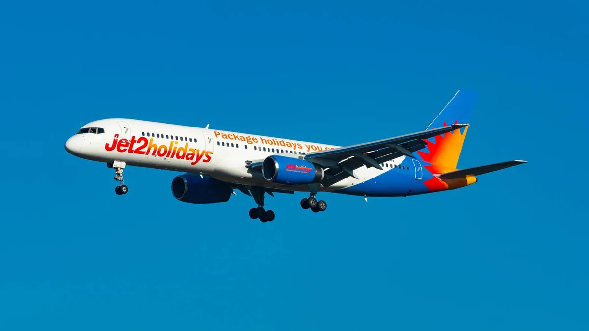 Boy calms passenger jet2 flight image 1