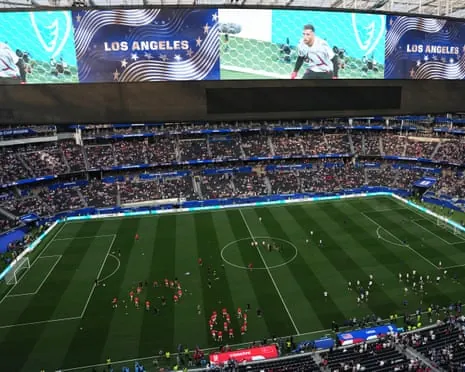 Turkey and USA players warm up on the pitch before their World Cup group game