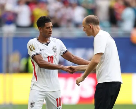 Thomas Tuchel shares a moment with Jude Bellingham, scorer of England’s sixth goal