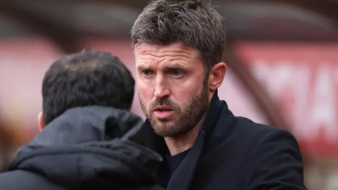 SUNDERLAND, ENGLAND - MAY 09: Michael Carrick, Manager of Manchester United, interacts with Regis Le Bris, Manager of Sunderland, prior to the Premier League match between Sunderland and Manchester United at Stadium of Light on May 09, 2026 in Sunderland, England. (Photo by Stu Forster/Getty Images)