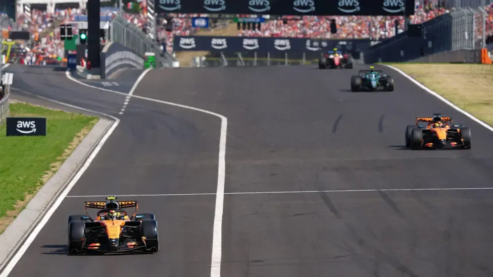 Lando Norris comes out of the pits ahead of McLaren team-mate Oscar Piastri