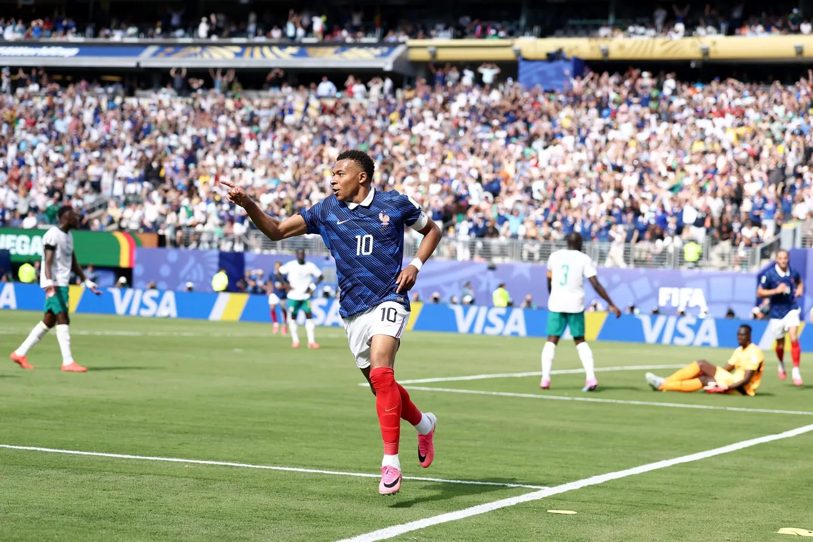 Mbappe celebrating by pointing