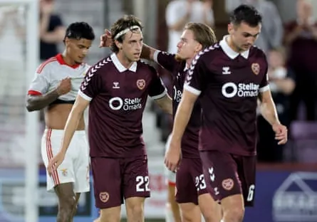 Tómas Magnússon (left) is congratulated by his teammates after scoring for Hearts against Benfica