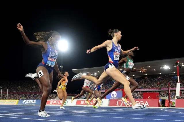 Amy Hunt crosses the line in first place ahead of Ireland’s Rhasidat Adeleke, right, in second and Dina Asher-Smith in third (Martin Rickett/PA)