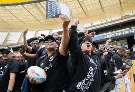 All Blacks fans cheer during an event to mark the team’s arrival in Cape Town