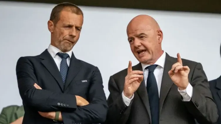 UEFA President Aleksander Ceferin and FIFA President Gianni Infantino are seen on the tribune